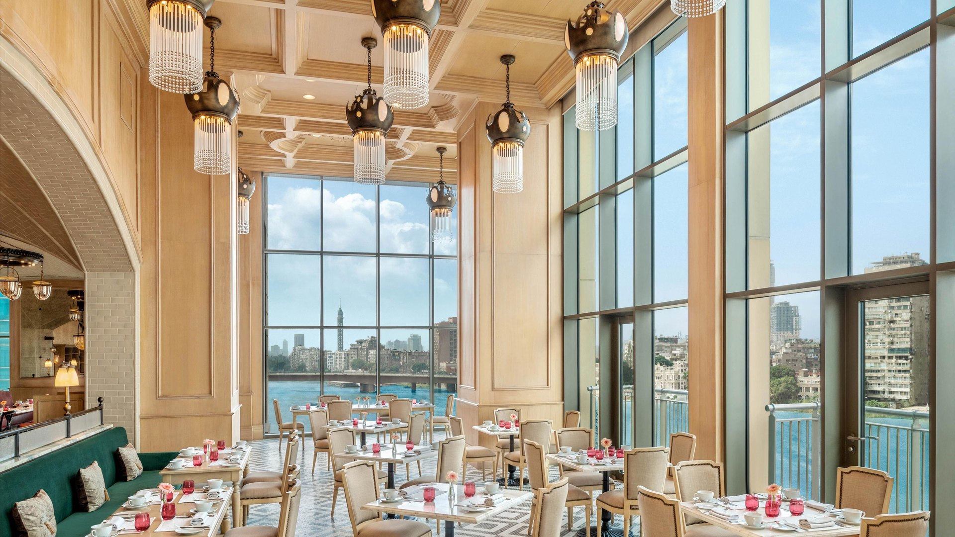 La Zisa at The St. Regis Cairo, its tall windows facing the Nile and Cairo Tower