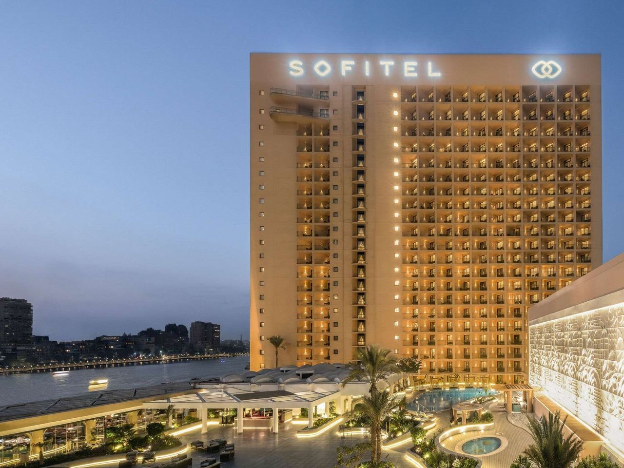 The Sofitel Cairo Downtown Nile on the Corniche at dusk