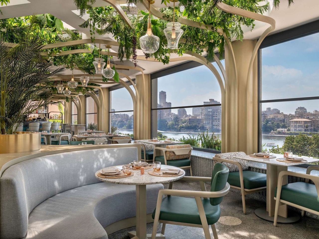 A restaurant at the Sofitel Cairo Downtown Nile, its windows facing the river